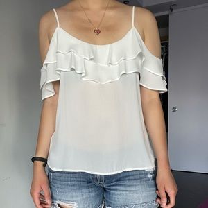 Flowy white tank top with flutter sleeves